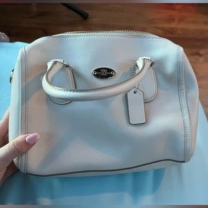 Light creme coach purse